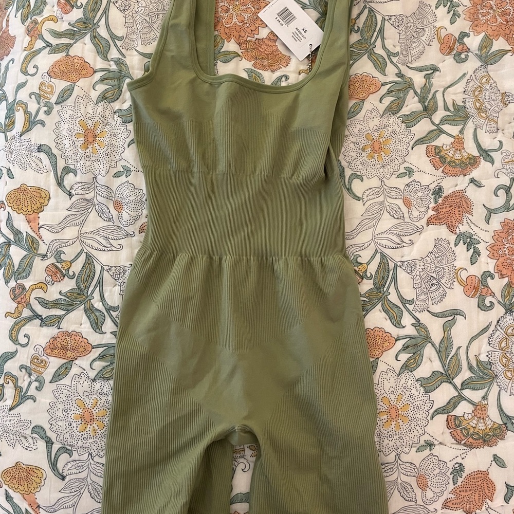 BRAND NWT We Wore Wht Active Bodysuit